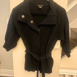 Adorable and very warm black chunky cardigan with snaps and a belt.